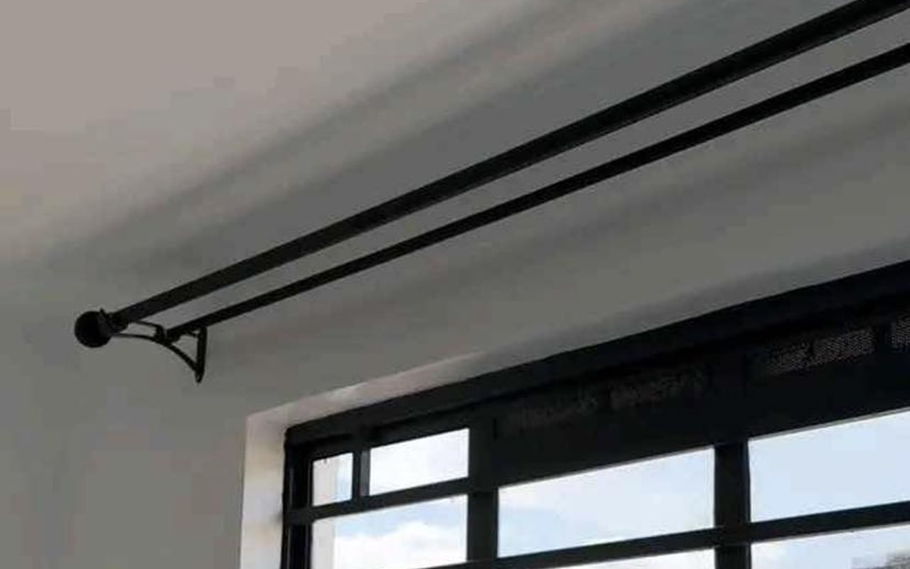 Curtain rods installation team